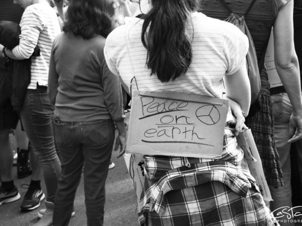 <span>Peace on Earth</span><i>→</i>